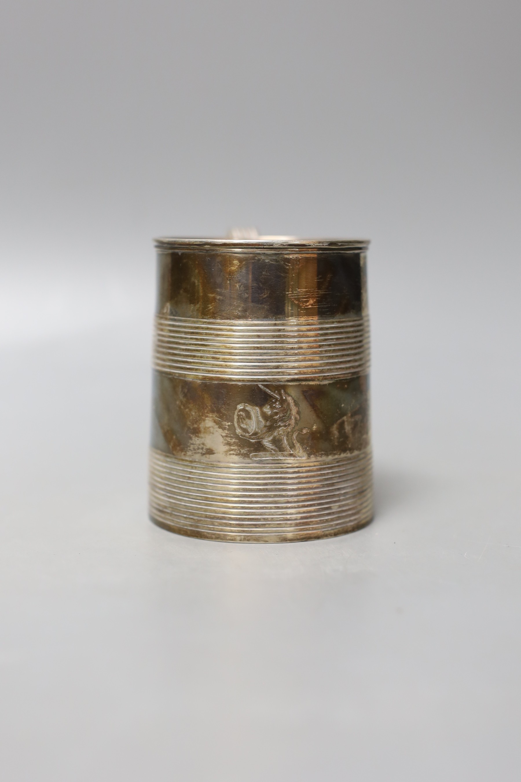 A George III silver mug, with two reeded bands and engraved inscription to the base, no maker's mark, London, 1801, 87mm, 203 grams.